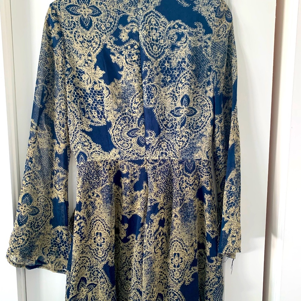 Funky Romper with sheer bell sleeves